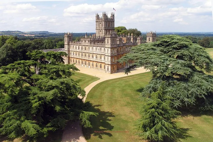 Highclere Castle front and lawn on a Downton Abbey day tour from London, England