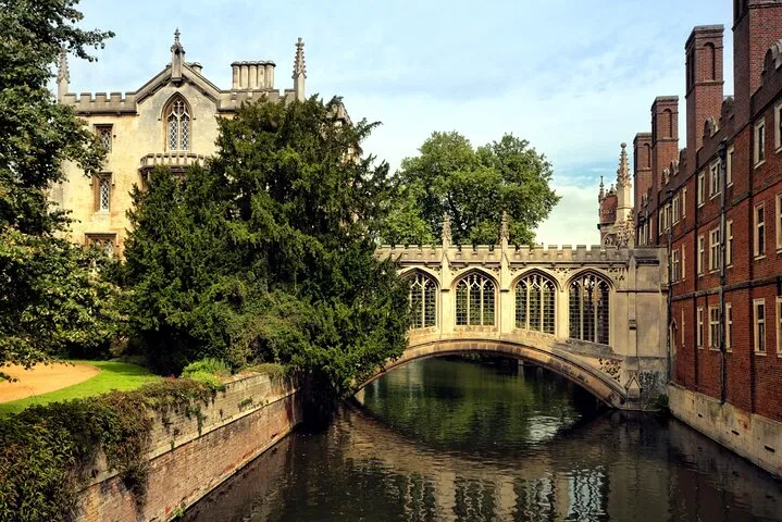 Warwick Castle towers beside the River Avon on a Stratford and Warwick day tour from London, England