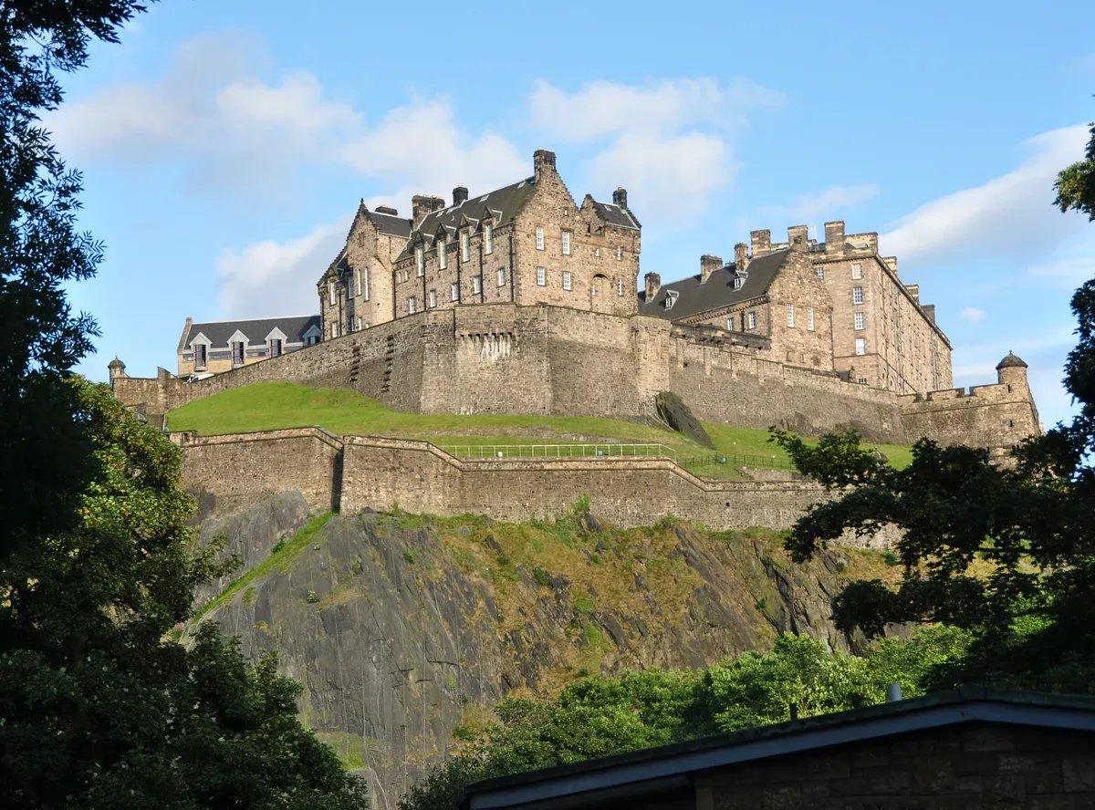 Edinburgh Castle on its rock above Princes Street Gardens on a three-day trip from London