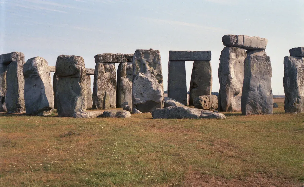 Standing stones of Stonehenge on Salisbury Plain, a stop on a day trip from London with Windsor and Bath