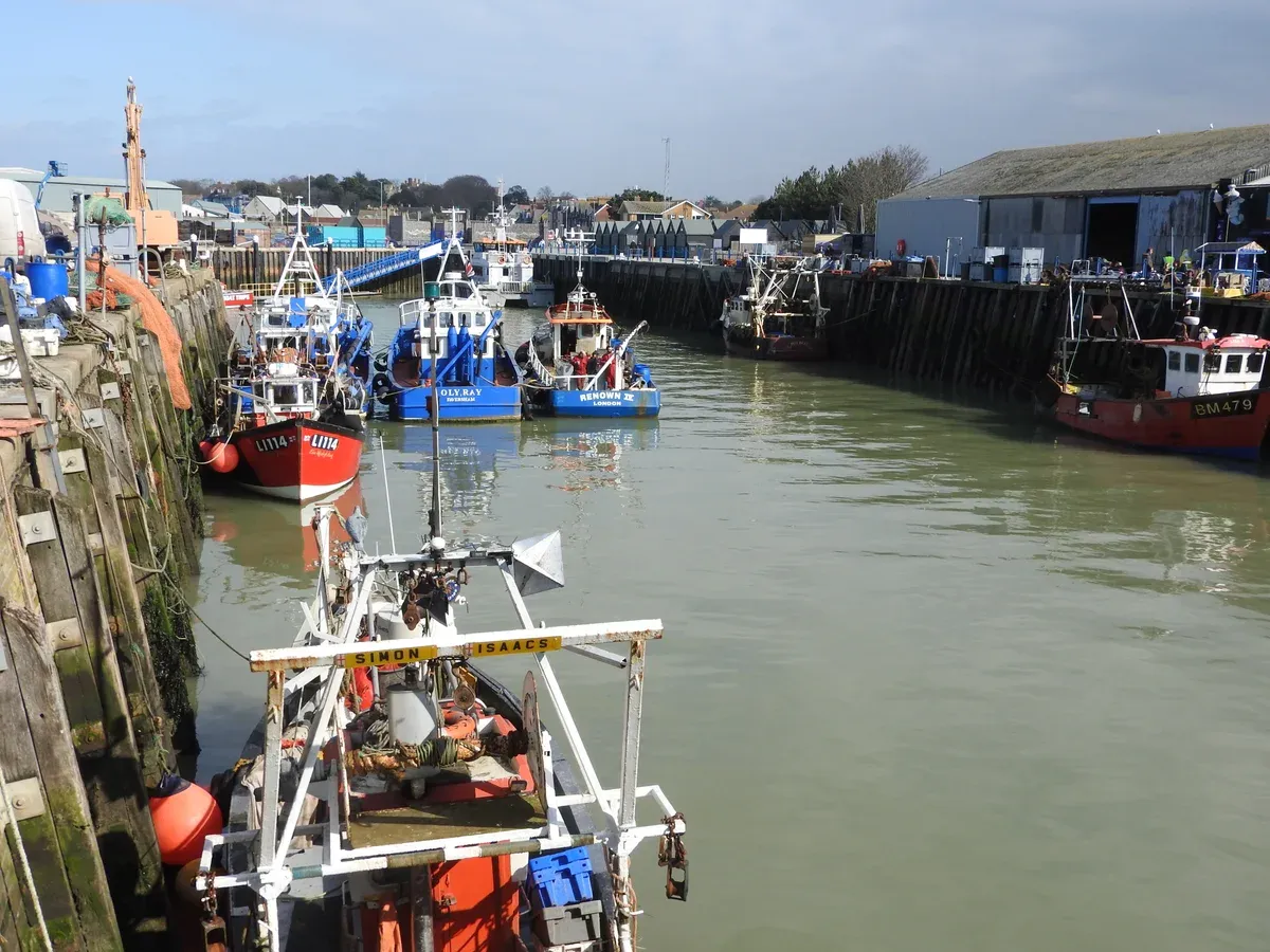 Fishing boats in Whitstable Harbour on a day trip from London